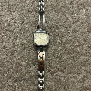 Rumors womens vintage silver stainless steel spinning heart charm watch one size